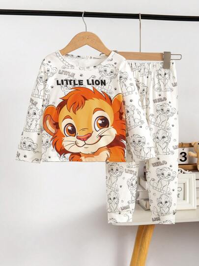 Conjunto lindo de tema de león de dibujos animados para niños pequeños, con camisa de manga larga y pantalones, hecho de tela suave y cómoda para proteger la piel sensible.